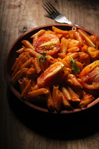 Penne pasta in a spicy red tomato sauce